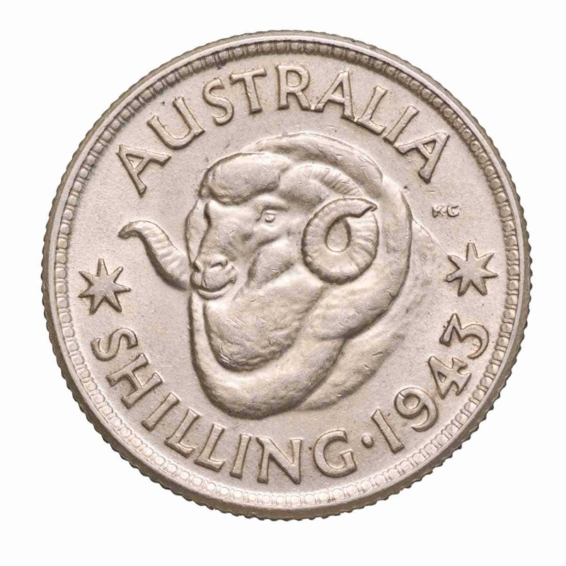 1943 Shilling about Uncirculated