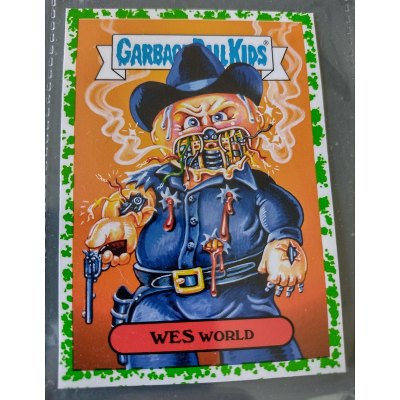 Garbage Pail Kids Oh the Horror-Ible Modern Sci-Fi #5a – Wes World Green Puke Parallel Trading Card