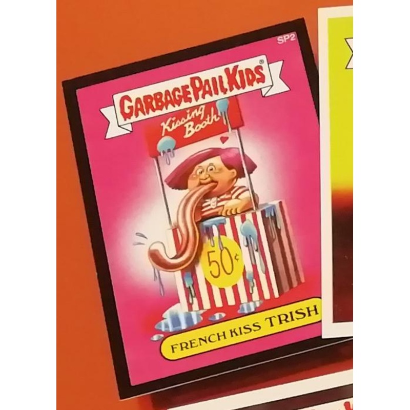 2015 Garbage Pail Kids Series – French Kiss Trish (Black Border variation) Comicbook Promo Card