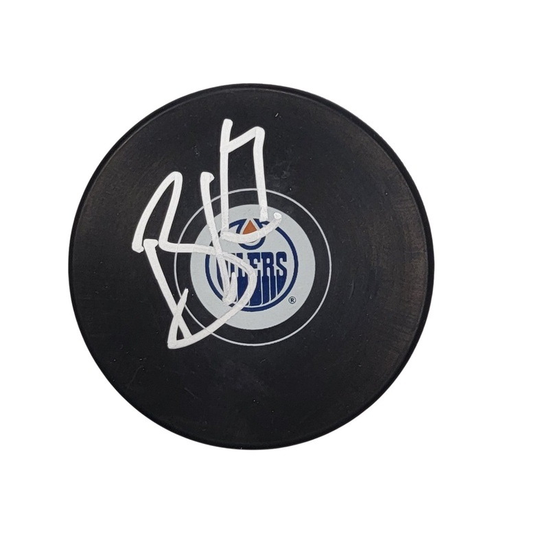 Brett Kulak Autographed Edmonton Oilers Logo Hockey Puck Beckett Authenticated